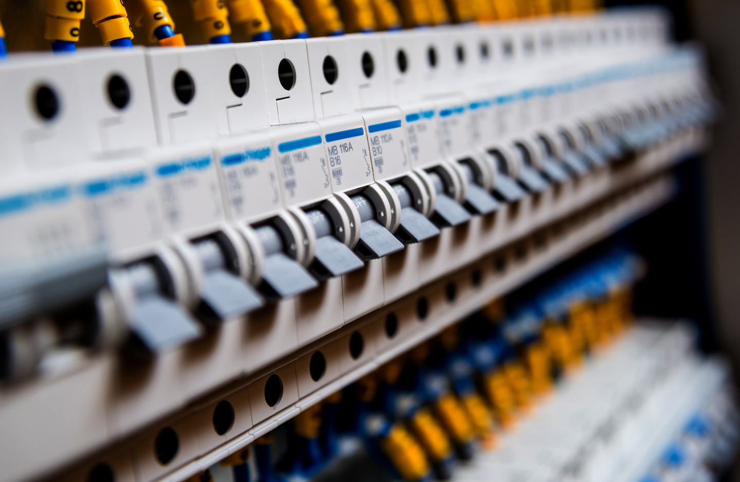 Voltage,Switchboard,With,Circuit,Breakers.,Electrical,Background Commercial Electrical Switchboard